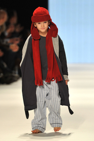 Illustration for article titled Adorable Child Fashion Show Fraught With Inner Grown-Up Conflicts